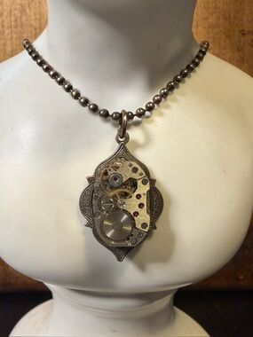 Steampunk Moroccan necklace. Vintage watch parts. Ruby.